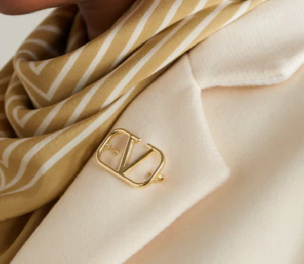 V GOLD BROOCH